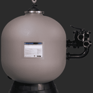 A large beige sand filter with valves attached on the side.